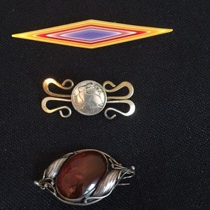 Jewelry 3 different pins.